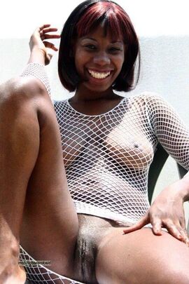 Black pussy upskirt. Mature black woman posing nude